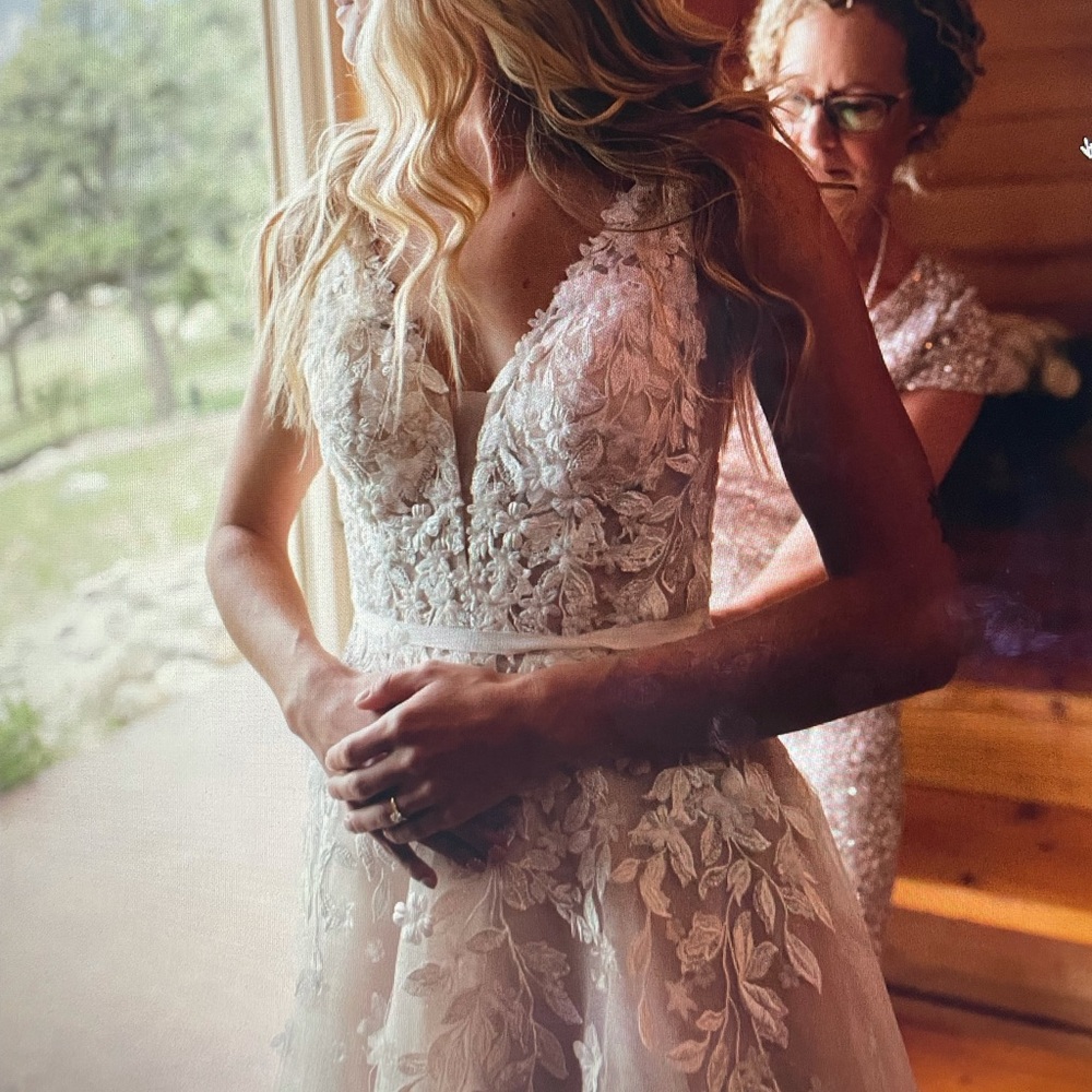 Brand new, never worn BHLDN wedding dress w/ hole